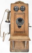 Vintage Swedish American Telephone Company oak cased hand cranked telephone, H65cm
