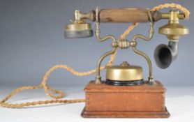 Ericsson or similar vintage house telephone with brass fittings, Bakelite mouth trumpet and 'press