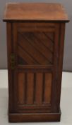 Early 20thC walnut or similar pot cupboard with plank design, W38 x D35 x H73cm