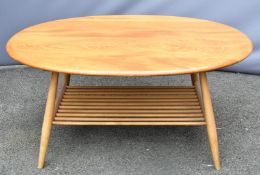 Ercol mid century modern light elm coffee table with slatted undershelf, maximum diameter 99cm x