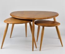 Ercol mid century modern light elm nest of 'pebble' tables, largest diameter 65cm