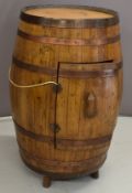 Arts & Crafts copper coopered barrel cupboard with inset marquetry circular panel of ducks in