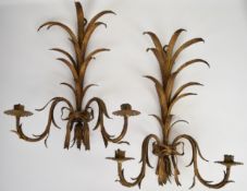 Pair of gilt metal wall mounted candelabra with leaf and bow decoration and suspension loops, H50cm