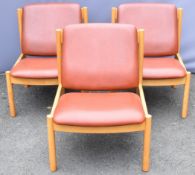 Three Ercol mid century modern light elm office style chairs with faux leather upholstery, design no