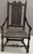 18thC ebonised oak peg jointed armchair with elm plank seat, H106cm