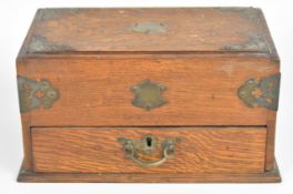 19th / 20thC metal bound and mounted oak stationery box with single action drawer operating a
