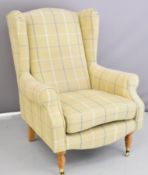 Contemporary upholstered armchair with check pattern