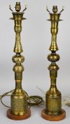 Pair of large Indian / Persian brass table lamps on wooden bases, H69cm