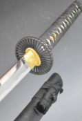 Japanese Samurai sword with bound grip, pierced circular guard, 71cm slightly curved blade (tip