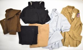 US Navy uniforms including wool smock and trousers with naval clothing depot label, skirt and