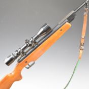 Original Model 45 .22 air rifle with semi-pistol grip, adjustable trigger, leather sling, sound