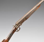 English .410 single barrelled hammer action shotgun with chequered grip and forend and named 30.5