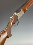 Winchester XTR Pigeon Grade 12 bore over and under ejector shotgun with scrolling engraving to the