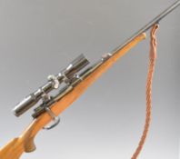 Puskarna .243 bolt-action rifle with chequered semi-pistol grip and forend, raised cheek piece,