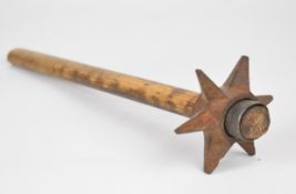 WW1 era trench club with pick helve handle and star shaped metal head, overall length 42cm