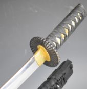 Japanese short sword with bound grip, pierced circular guards, 53cm single edged blade with