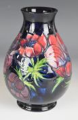 Moorcroft pedestal vase decorated in the Anemone pattern, H19.5cm