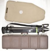 MGM Case-Gard High Low shooting table with adjustable tripod base, together with a shotgun or
