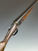 AYA 20 bore side by side shotgun with chequered grip and forend, border engraved locks, underside,