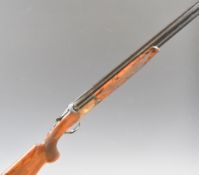 Renato Gamba Carrera 12 bore over and under ejector shotgun with gold engraving of birds to the