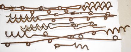 Nine WW1 silent barbed wire pickets including one example measuring 47cm, the others approximately