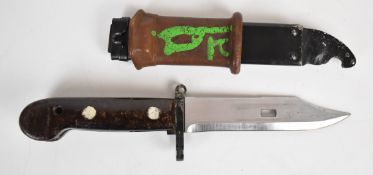 Russian AK47 bayonet with wire cutting facility, 14.5cm serrated blade, scabbard and rubber grip.