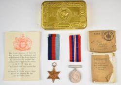 British Army WW2 medals comprising 1939-1945 Star and War Medal with box addressed to D.S Pavey,