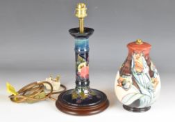 Two Moorcroft lamps decorated in the Finches and Tulip patterns, tallest 31cm
