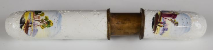 French enamelled metal bobbin case with decoration in relief and landscape cartouches