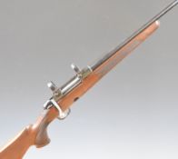 Tikka M595 .243 Winchester bolt-action rifle with chequered semi-pistol grip and forend, raised
