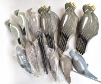 Twenty-seven various pigeon shooting decoys. all unused, some in original packaging.