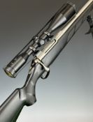 Tikka T3 .223 Remington bolt-action rifle with composite stock, textured semi-pistol grip,