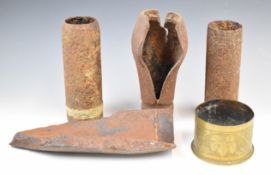 Trench art decorated pot from a shell case dated 1917 together with two shell heads, exploded