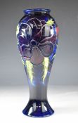 Moorcroft baluster vase decorated in the Anemone pattern, signed with monogram to base, H28cm