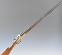 Belgian 28 bore side by side hammer action shotgun with border engraved lock, chequered grip and