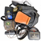 A collection of shooting and gun accessories including Bisley Electronic Hearing Defender in