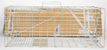 Two metal humane live animal traps/ cages, both unused.