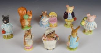 Eight Beswick Beatrix Potter figures including Pig Wig, Tailor of Gloucester, Pigling Bland and