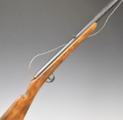 Flash Spotter training rifle, designed to project a beam of bright light to a point where the bullet