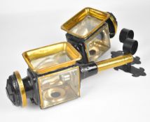 Pair of 19th or early 20th century carriage or coaching lamps with spring loaded candle holders,