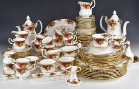 Royal Albert dinner and teaware decorated in the Old Country Roses pattern, including a clock,