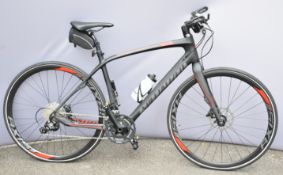 Specialized Sirrus Expert Carbon road bicycle with carbon frame, AX15 wheels and Magura front and