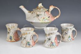 Willie Carter studio pottery teapot and four mugs, signed to the body, tallest 13cm
