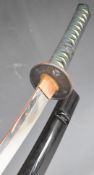 Japanese short sword with bound grip, signed tang, two menuki, circular guard, copper habaki, 96cm