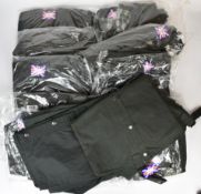 Twelve sets of John Rothery waxproof stud up lined short leggings or overtrousers, all unused with