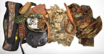 A collection of shotgun, rifle and shooting related items including leather cartridge bags and