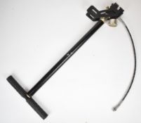 PCP air rifle or pistol pump with folding feet and pressure gauge.