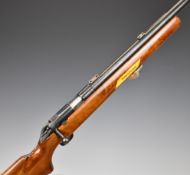 Winchester 52D .22 bolt-action target rifle with various sets of scopes and sights including