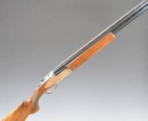 Rizzini 12 bore over and under ejector shotgun with engraved scenes of birds to the sidelock