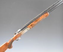 Remington 3200 Special Trap 12 bore over and under ejector shotgun with engraved scenes of dogs to